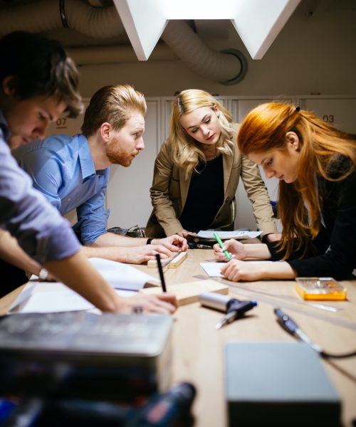 Business people collaborating in office and working on project together