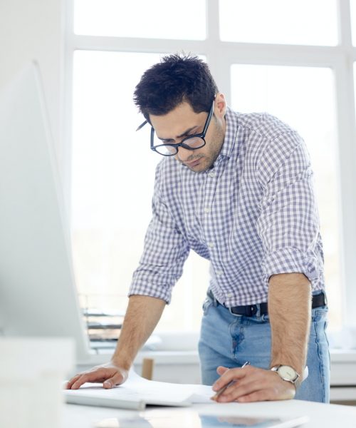 Middle-Eastern Man Working in Office
